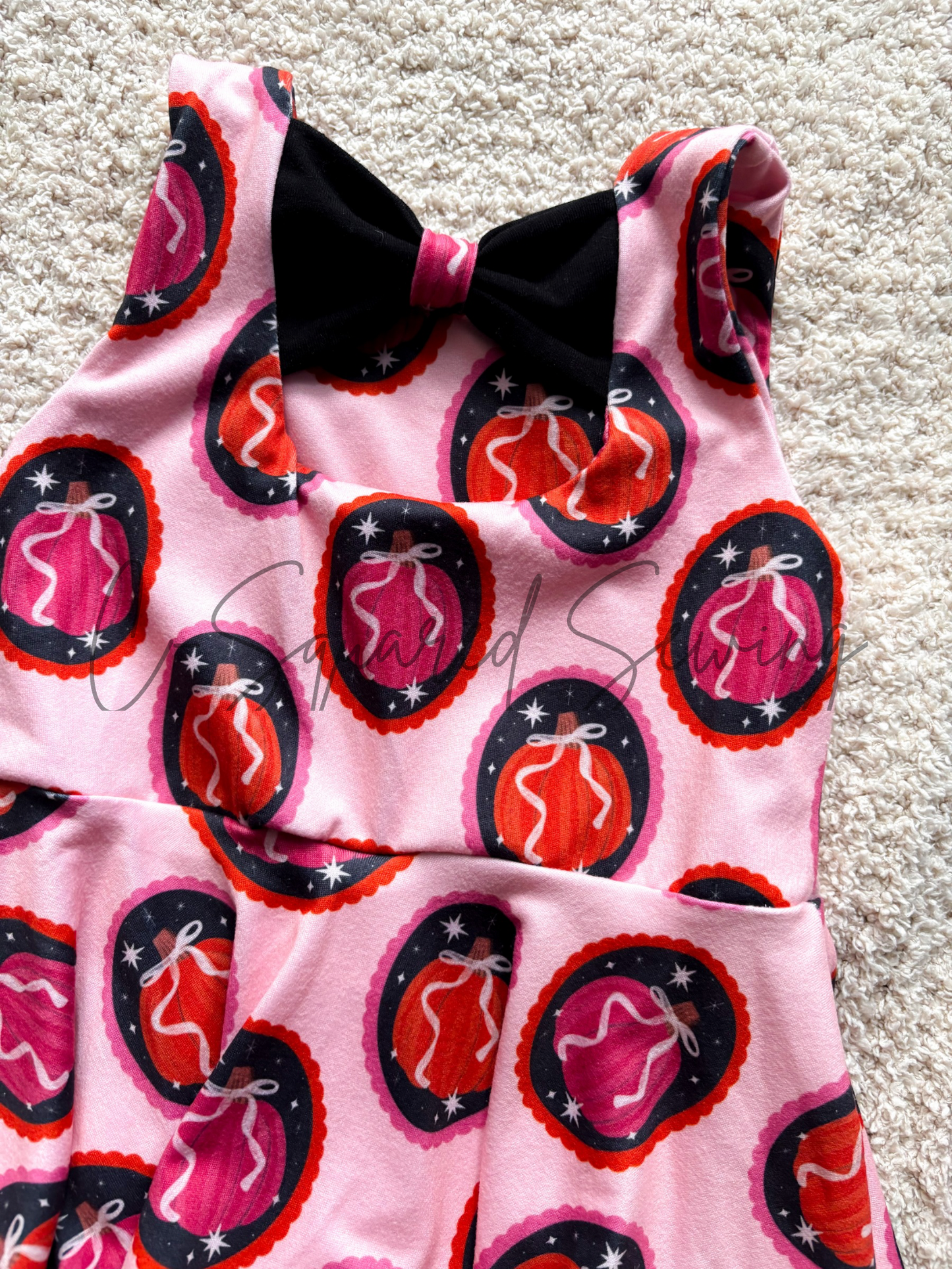 Bow Back Peplum